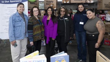 Photo of Ortega and event organizers