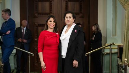 Photo of Asm. Ortega and guest for HR23 Cesar Chavez Day in session